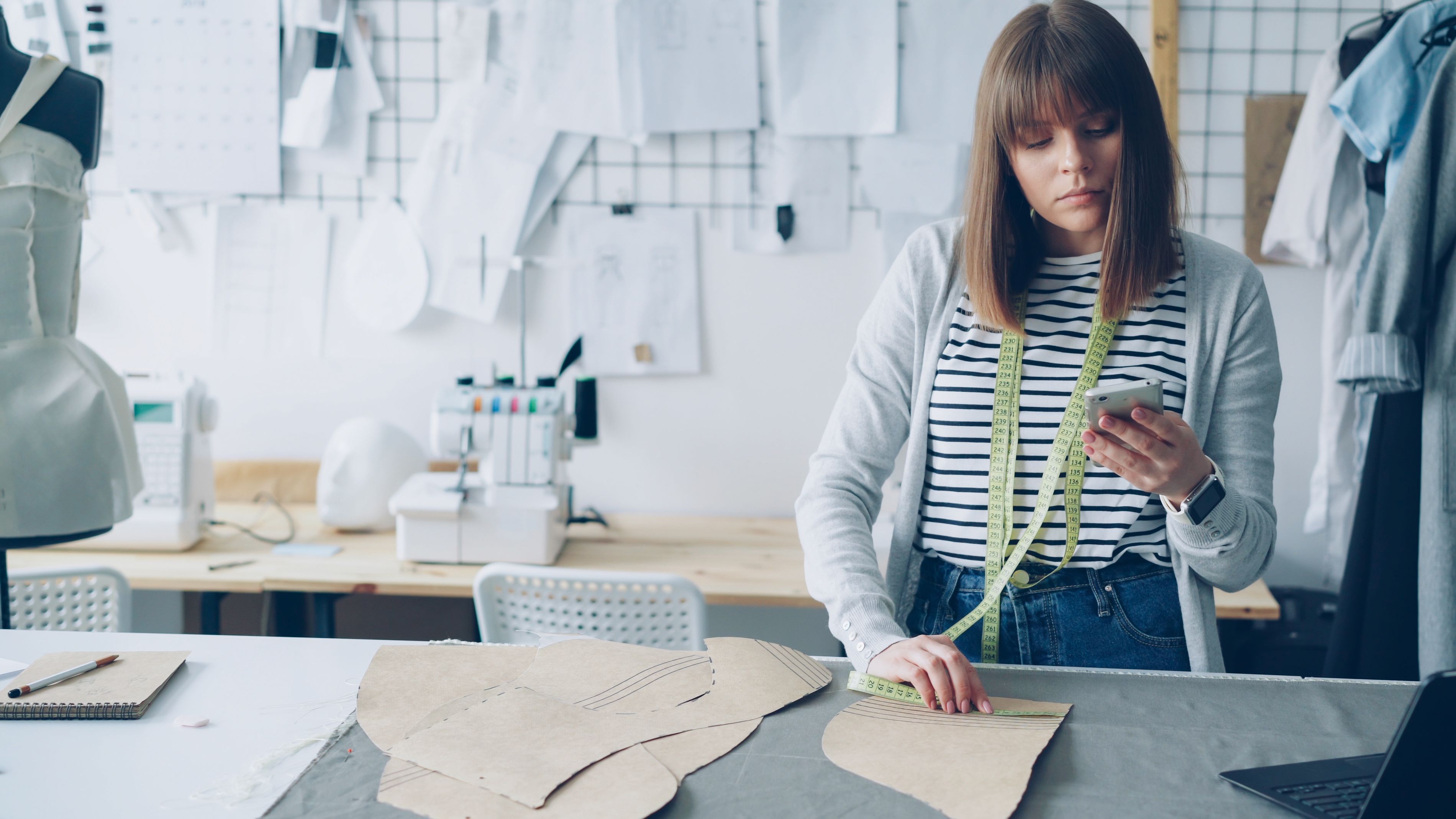 Fashion designer developing garment patterns and samples for an apparel order